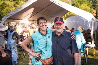 Mary Ann Breisch and Jeff Dean posing at the festival in 2015